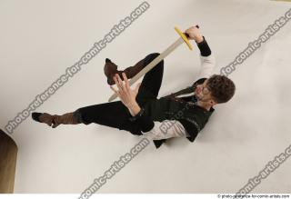 KEETA LAYING POSE WITH SWORD